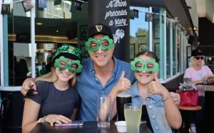 A family at St.Patrick's Day celebration at Fenians Irish Pub