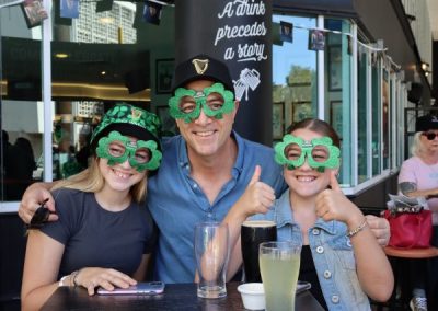 A family at St.Patrick's Day celebration at Fenians Irish Pub